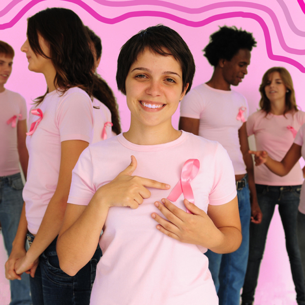 Group of women showing the pink ribbon, the symbol for the Breast Cancer awareness Campaign