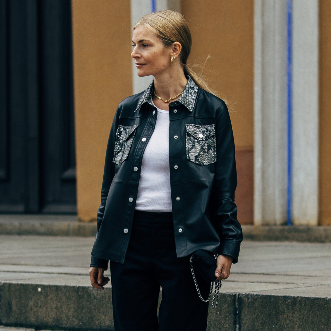 Instagramer over 40 styling tips wearing a black leather shirt with white tshirt