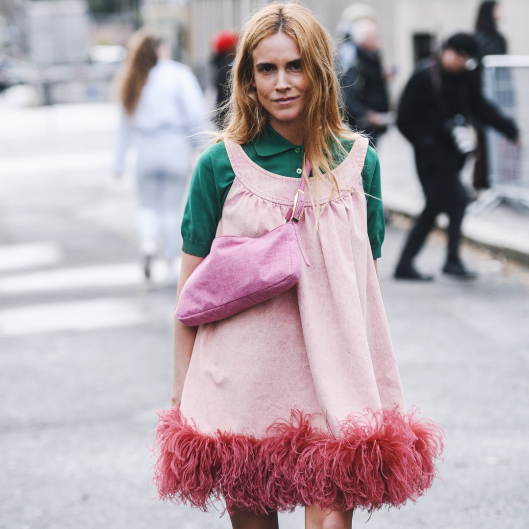 Blanca Miro during PFW wearing a minidress over a polo shirt, one of the items we'll be wearing this year