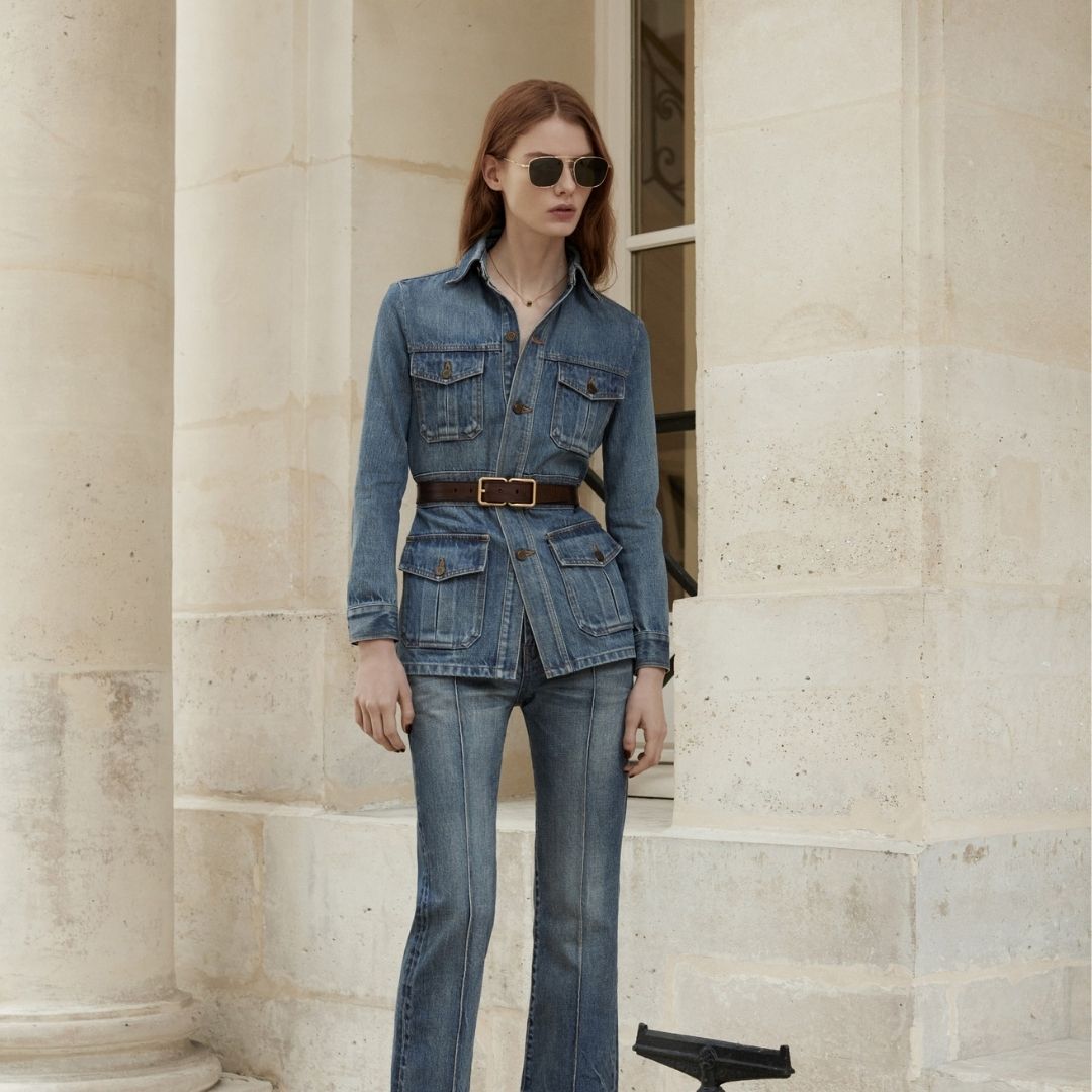 model wearing the must have piece for this fall 2021 a all denim outfit with a belted denim jacket from saint laurent