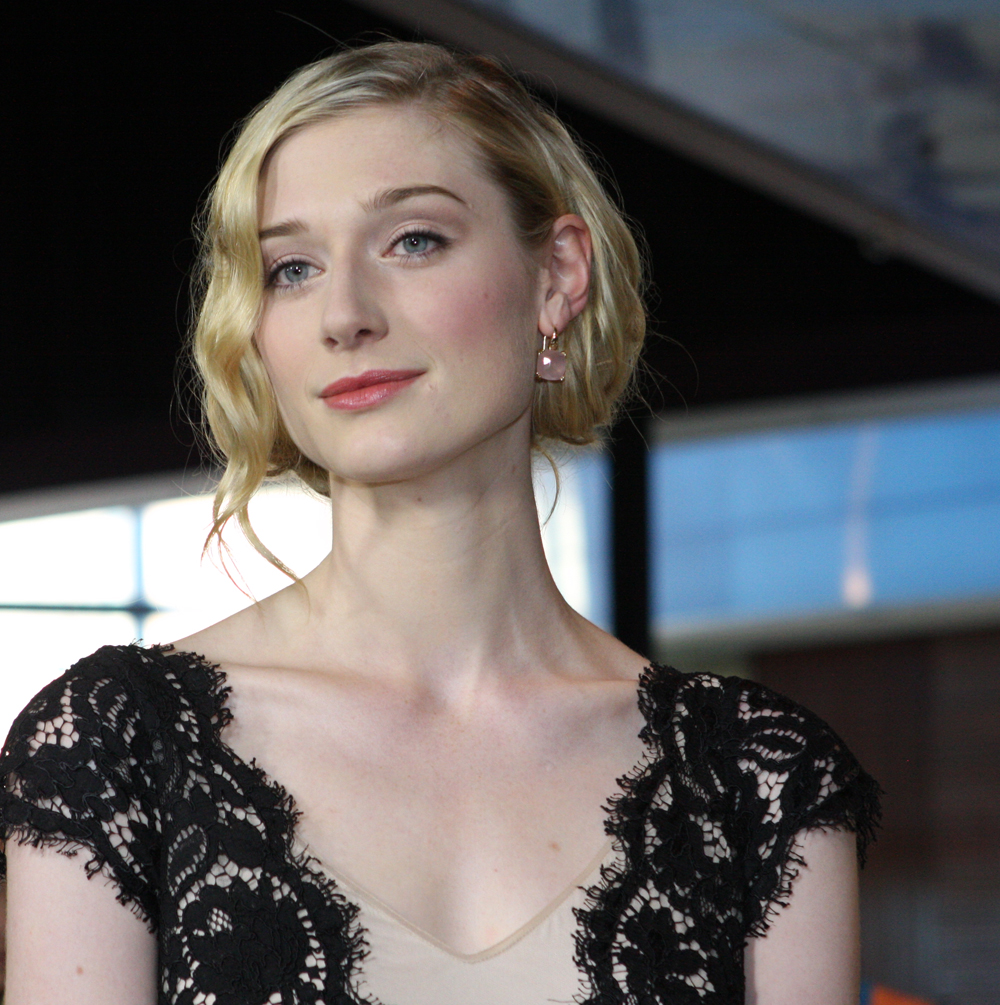 Elizabeth Debicki’s timeless style in a classic black and nude gown.