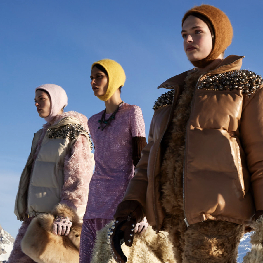 Models wearing the coolest hat and gloves for winter.