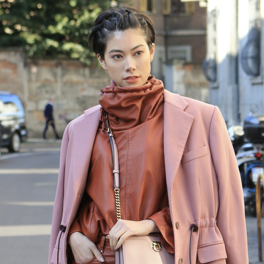 A petite woman wearing the long coat hack from our Dos and Don'ts.