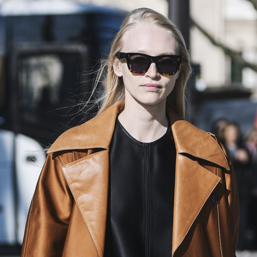 Fashion show goer wearing leather outfit, one of the street style trends at NYFW Fall 2022.