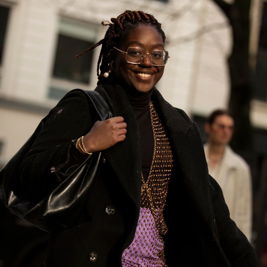 fashionista wearing a big wired frame glasses