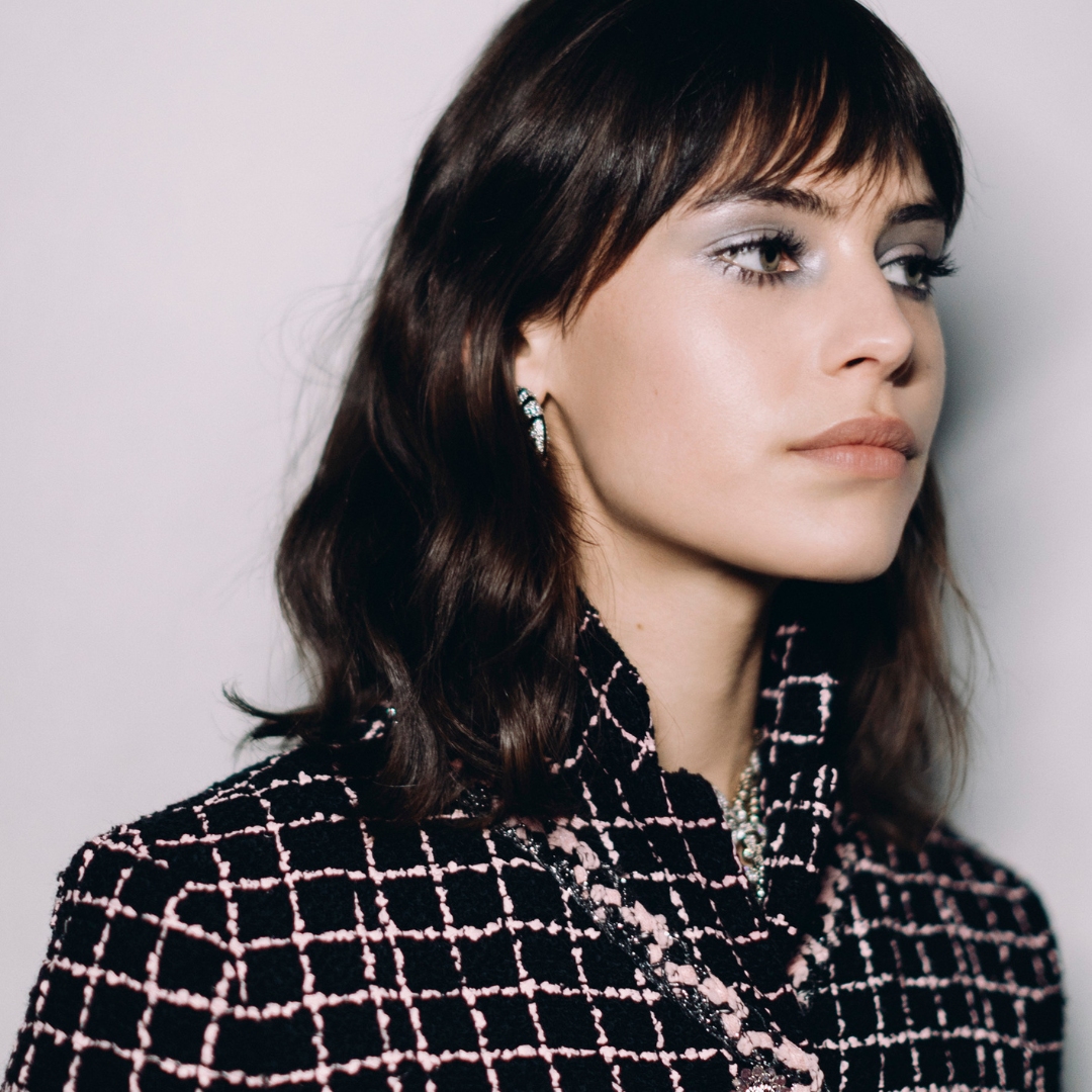 Chanel model wearing a frosted eye makeup at the backstage of the runway show AW23-24