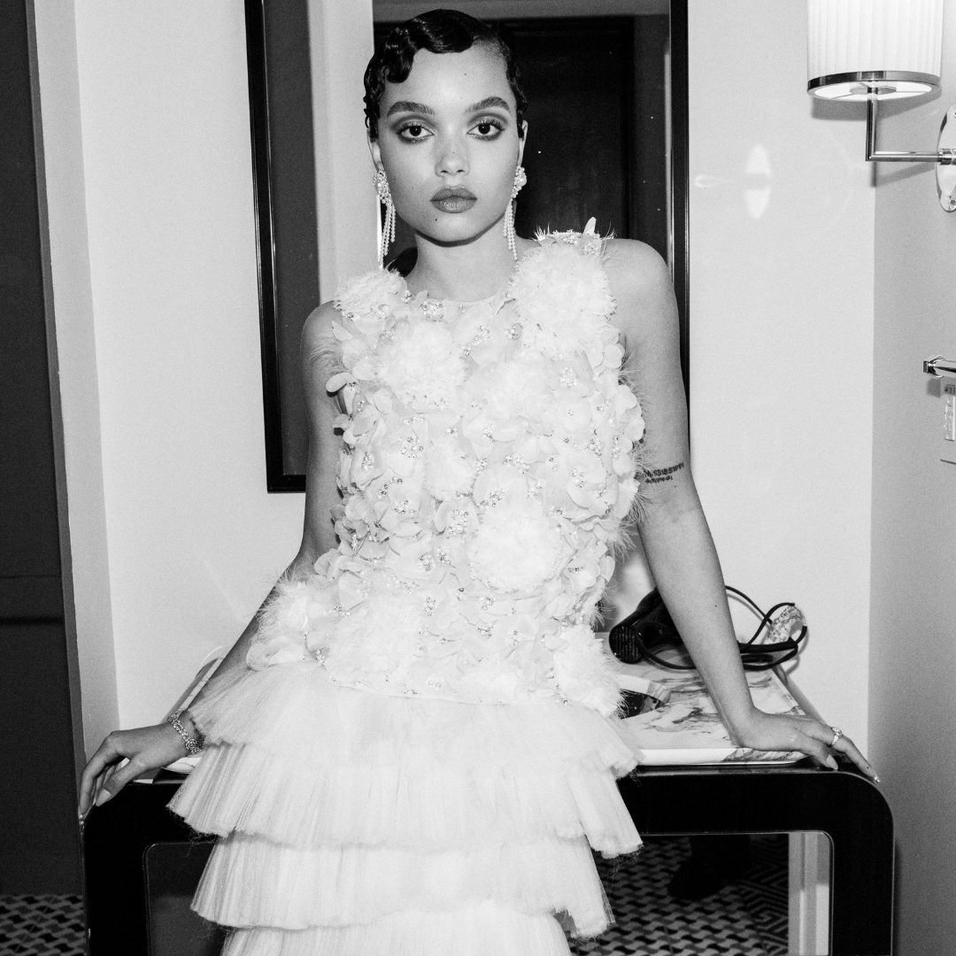 black white photo-Whitney Peak at Met Gala with Chanel