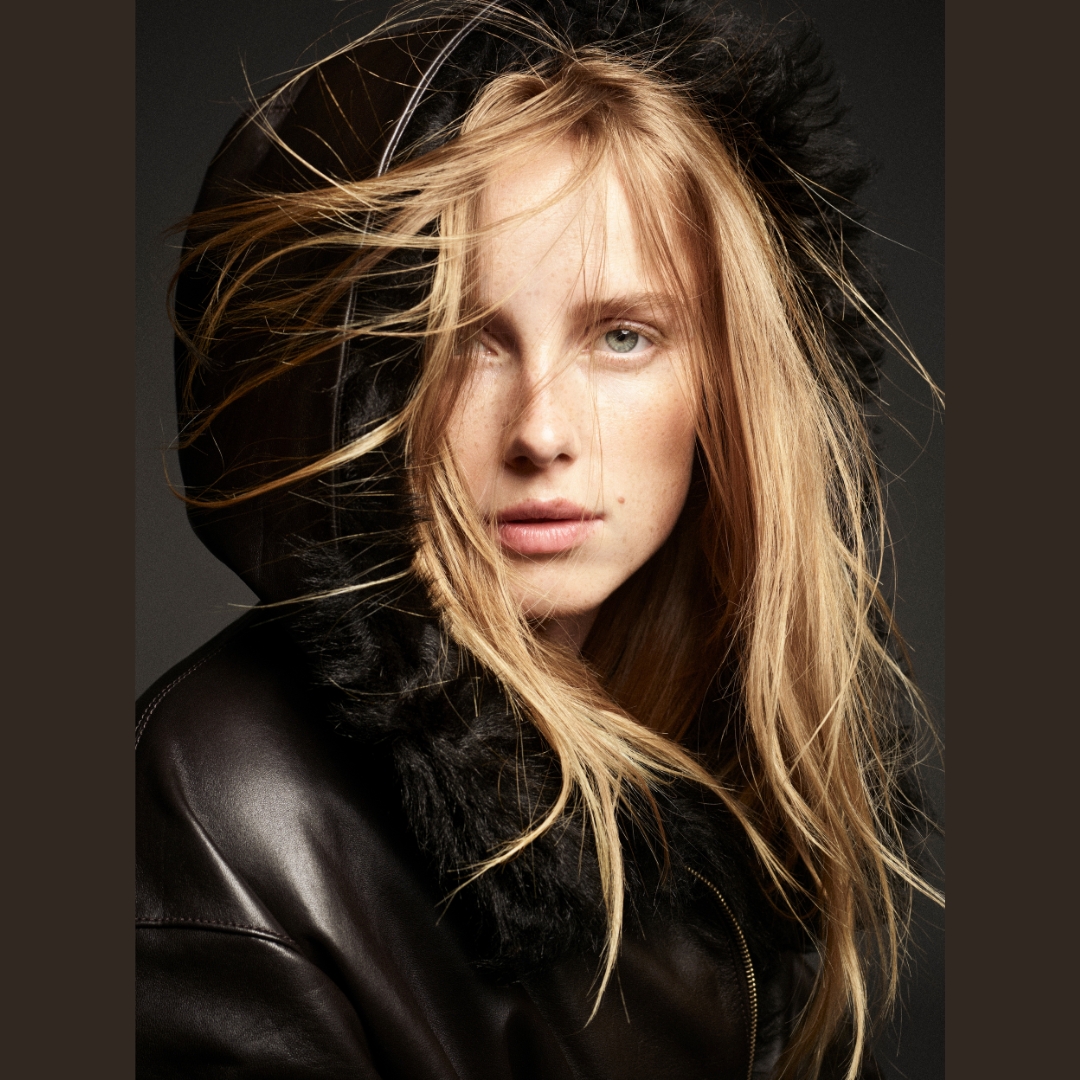 Model RIANNE VAN ROMPAEY wearing a leather hoodie, photographed for COS A/W 2024 campaign