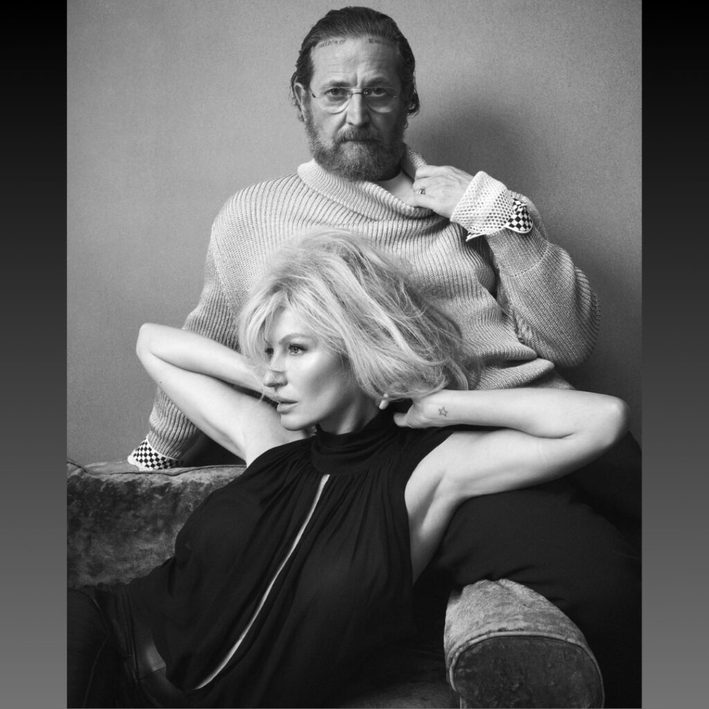 Black and white photo of Gisele Bündchen and Stefano Pilati photographed by Steven Meisel for Zara x Stefano Pilati Collaboration