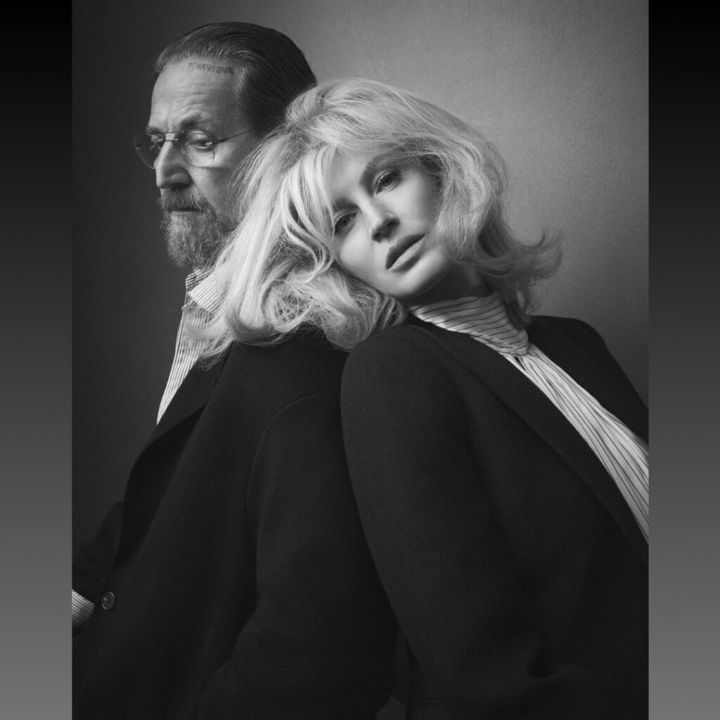 Black and white photo of Gisele Bündchen and Stefano Pilati photographed by Steven Meisel for Zara x Stefano Pilati Collaboration