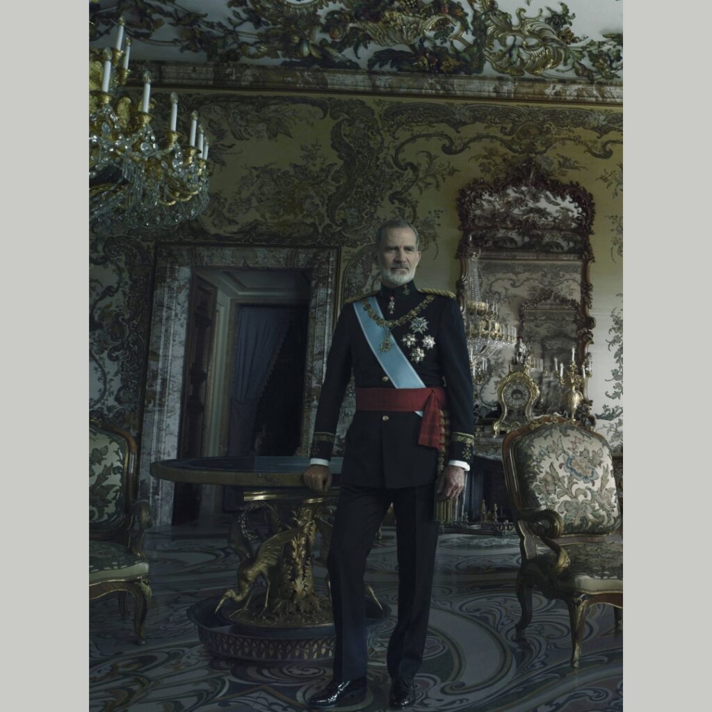 King Felipe Vi photographed by Annie Leibovitz wearing the Golden Fleece and the sky-blue sash of the Order of Carlos III