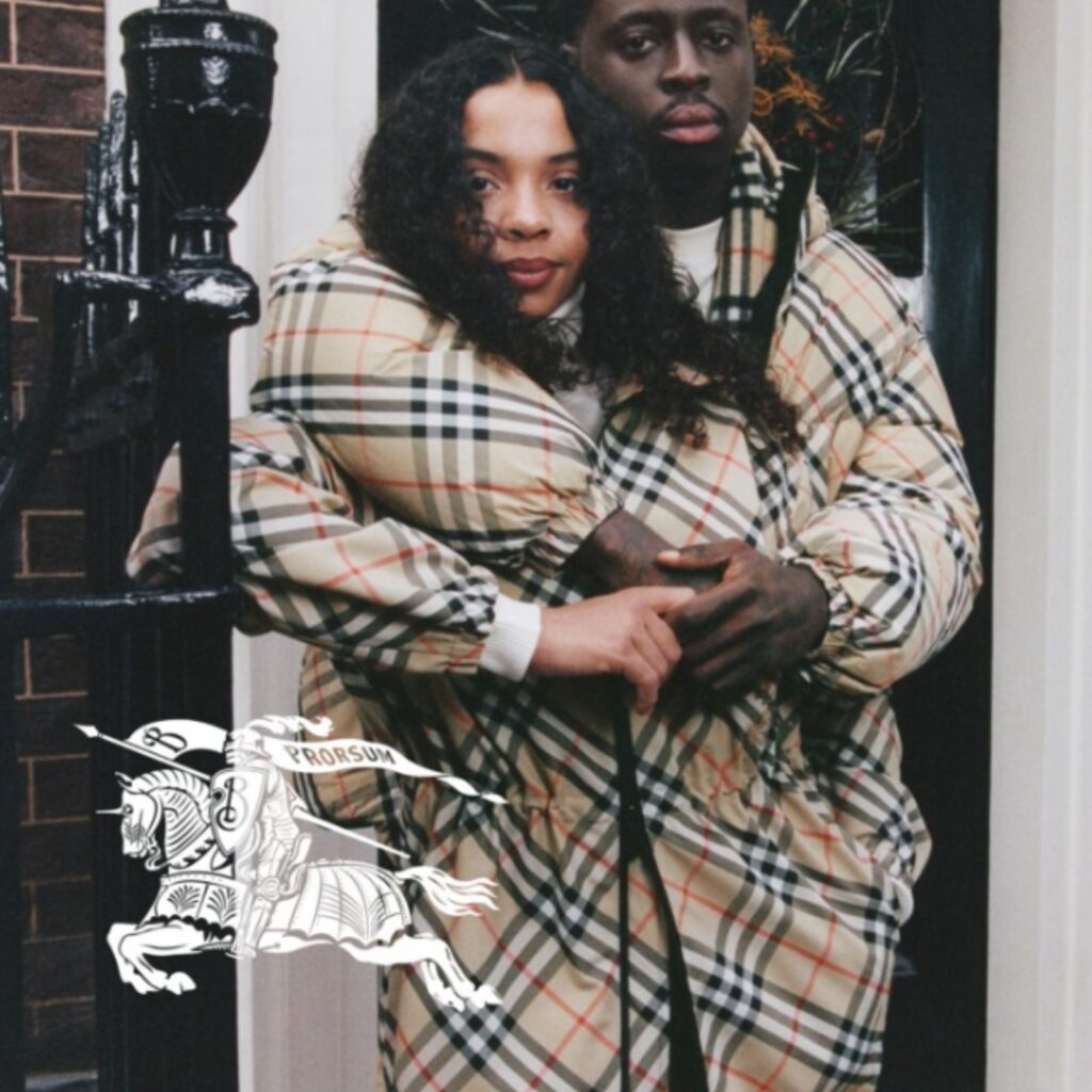 burberry campaign 2024 young mixed-race couple embracing wearing burberry.