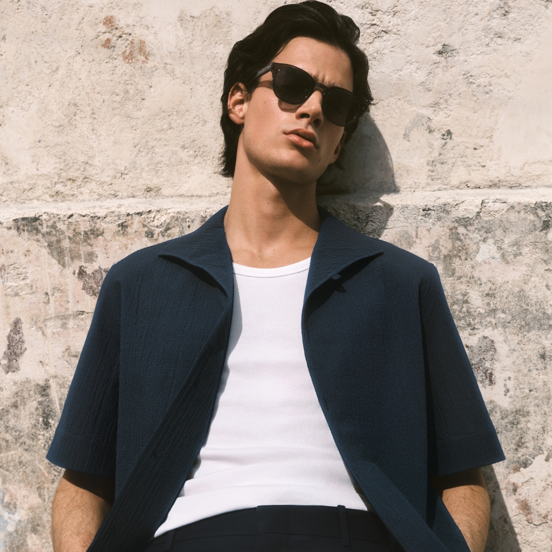 Model wearing a short sleeve shirt from COS Summer 2025 Menswear collection
