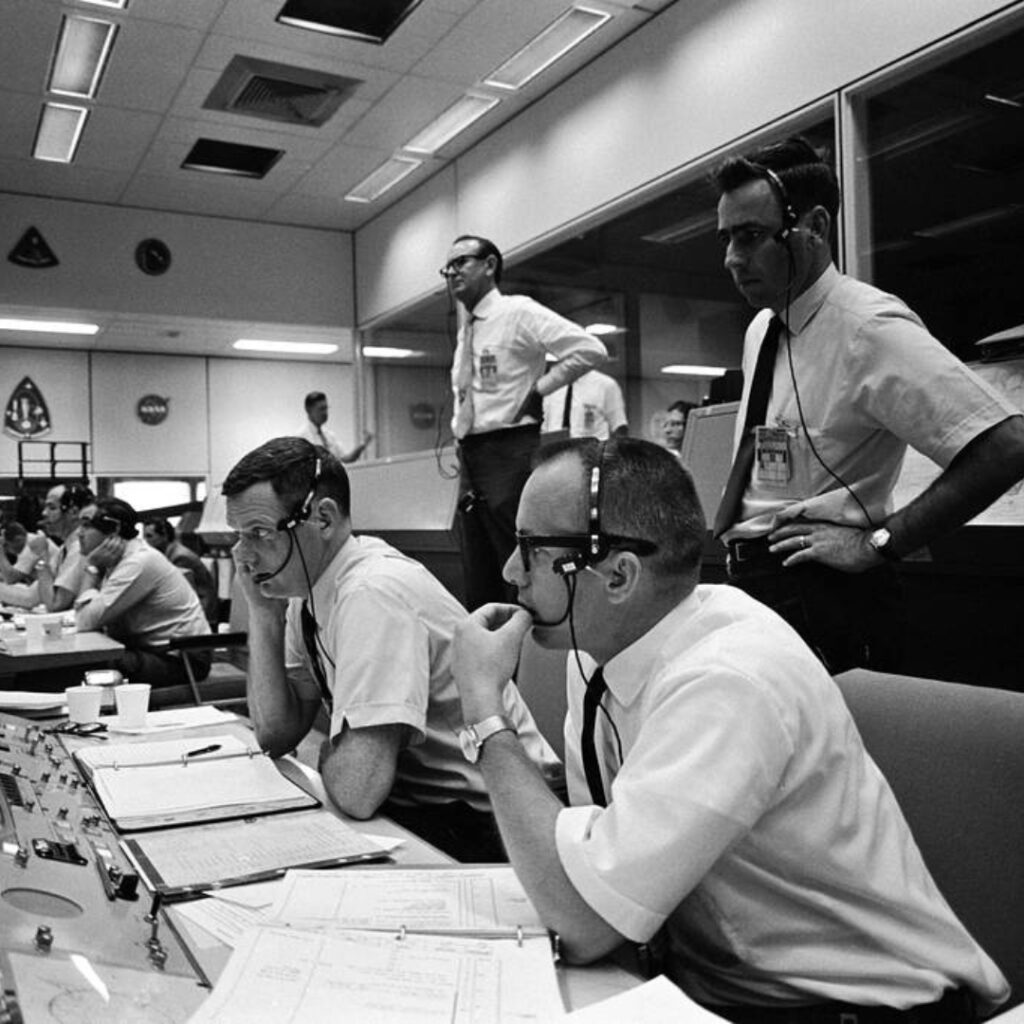 In the room from NASA, scientist and mathematicians were wearing short sleeve shirts back in the 70s