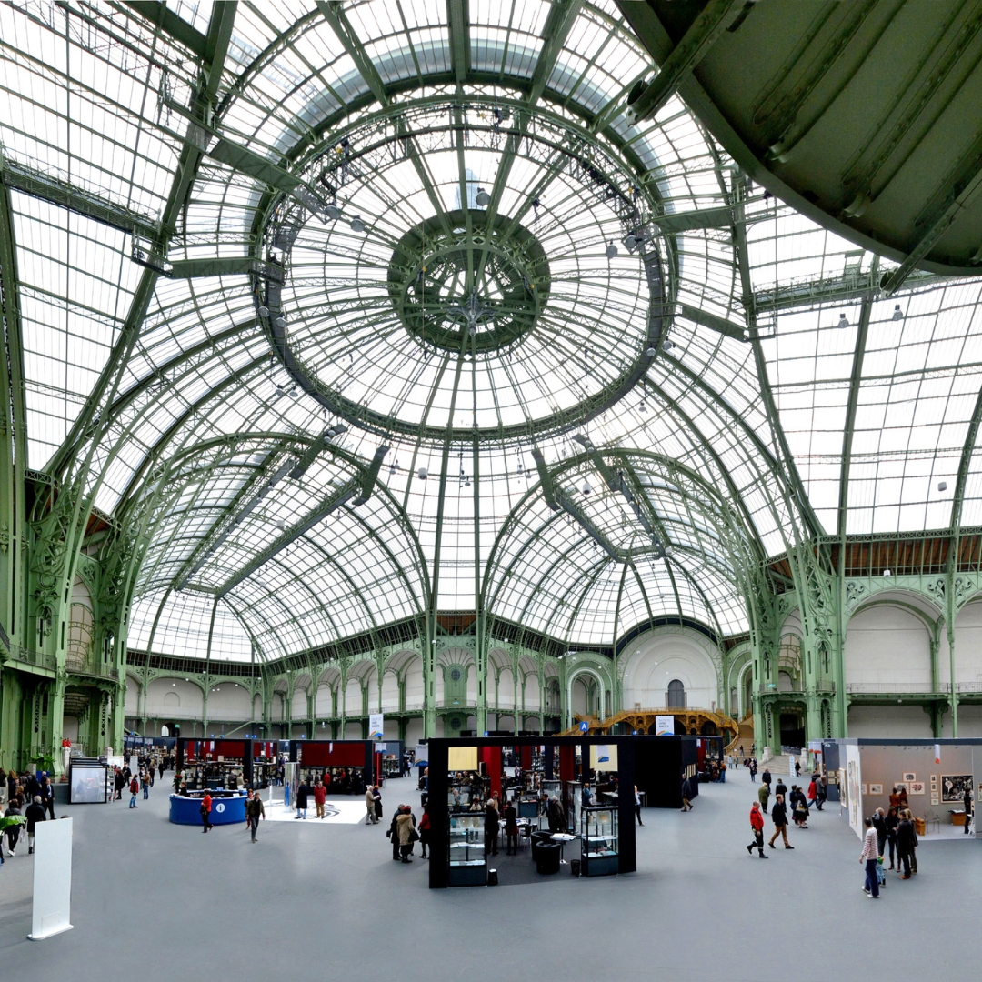 The iconic glass dome filled with galleries and visitors.