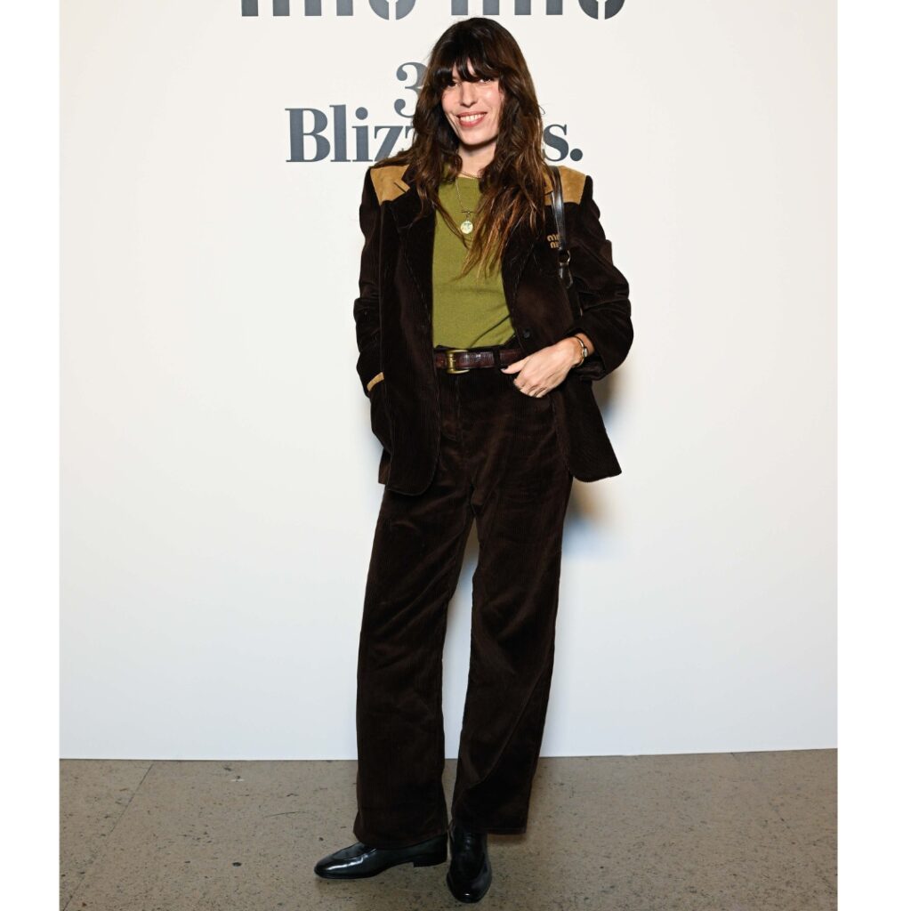 Lou Doillon wearing a Miu Miu suit at 30 Blizzards. vernissage in Paris