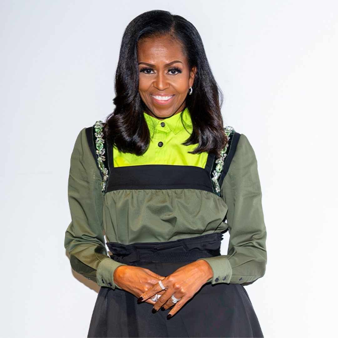 Michelle Obama promoting The Look in a tailored Prada Dress.