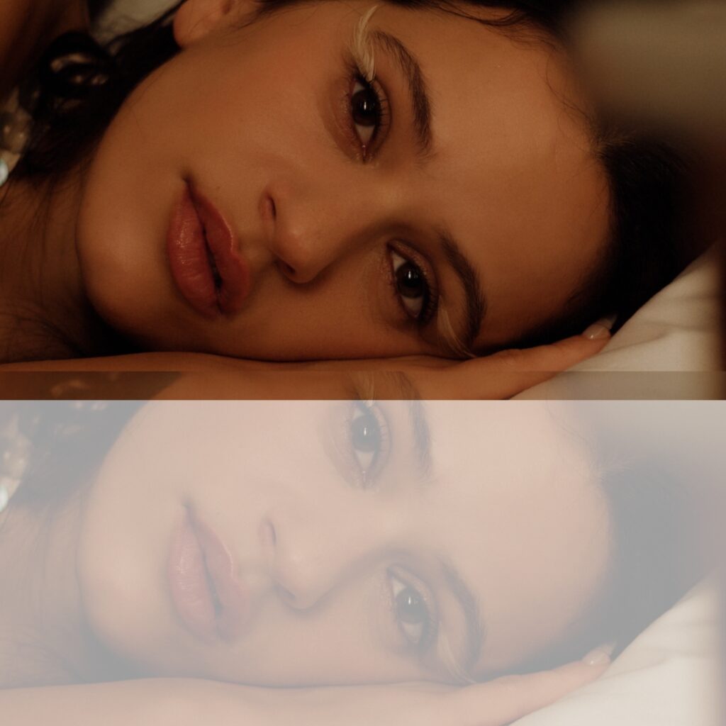 Rosalía in soft lighting, contemplative expression, symbolising the spiritual tone of LUX