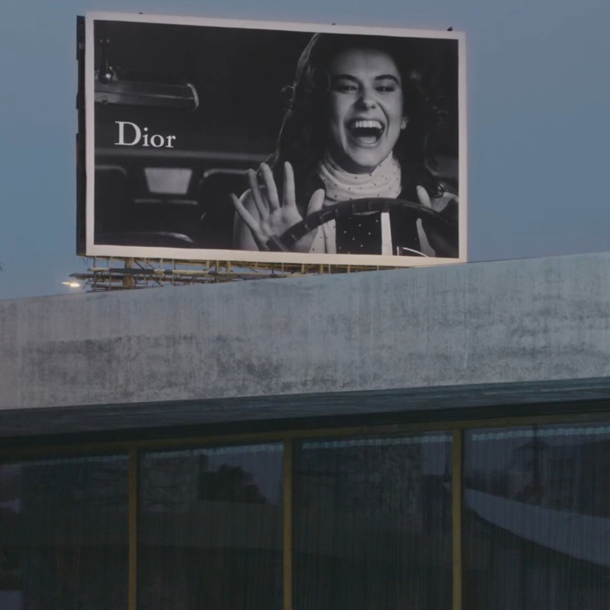 Dior Cruise 2027 - Dior billboard on a bridge in hollywood