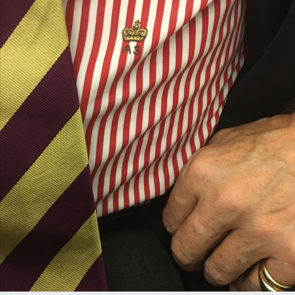 detail of a monogram on a male bespoke shirt